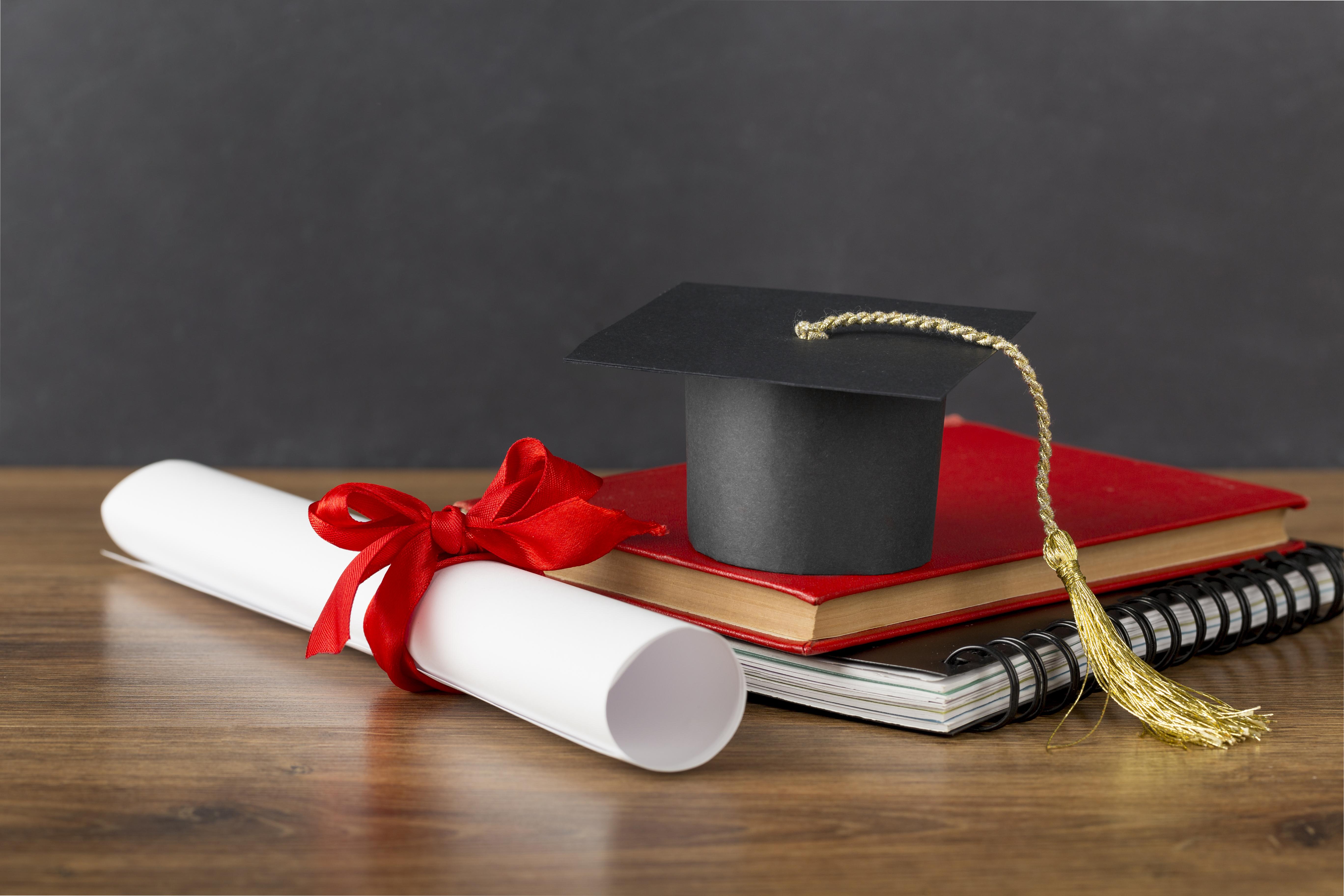 education-day-arrangement-with-graduation-cap